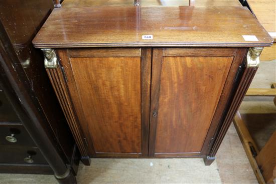 A Regency style mahogany two door cupboard